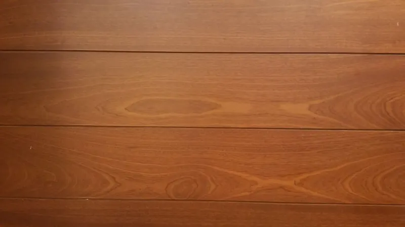 Rich brown wood panels with natural grain and texture, perfect for backgrounds or designs